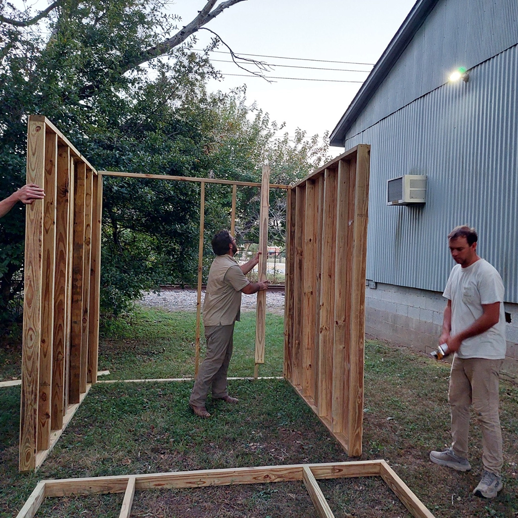 men building a shooting house